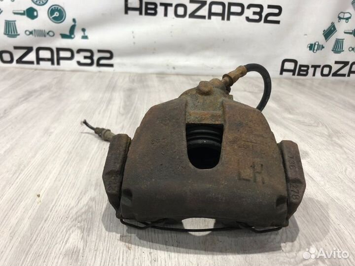 Суппорт тормозной передний левый Ford Focus 2 qqdb