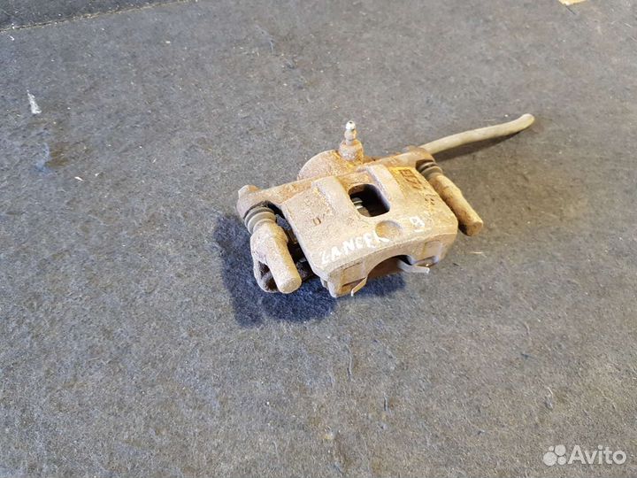 Суппорт задний правый Mitsubishi lancer 9