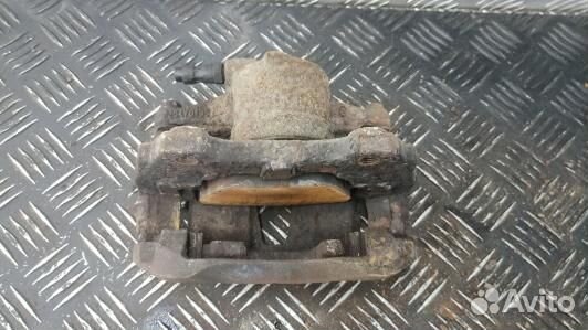 Суппорт тормозной передний левый opel corsa D (2GM14K701)