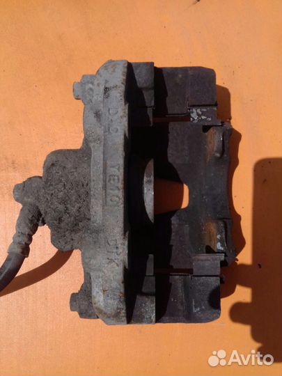 Суппорт тормозной передний Chevrolet Lanos