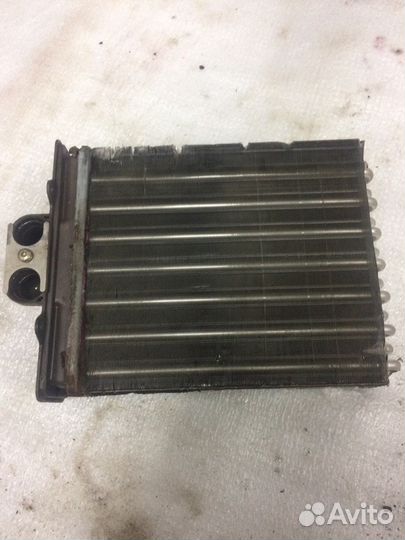 Радиатор печки Опель Вектра А