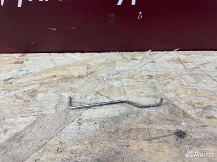 Тяга привода замка багажника Renault Logan