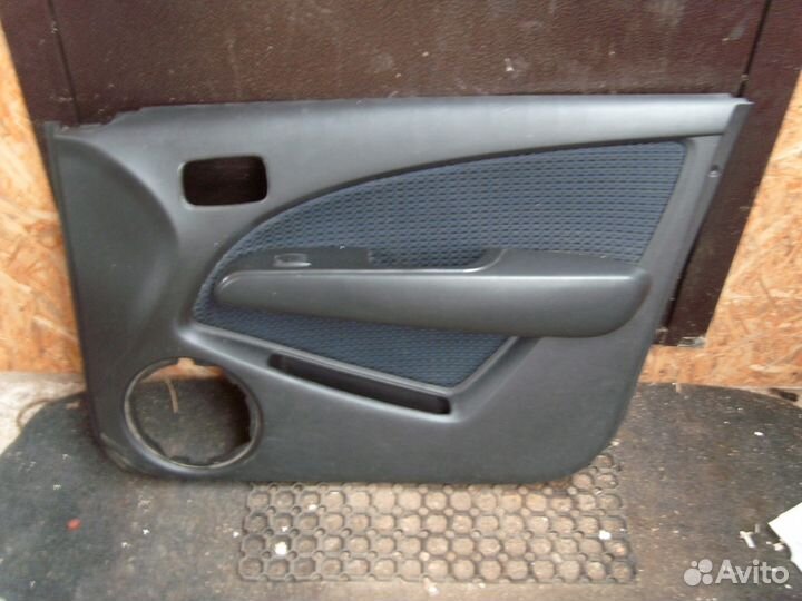 Обшивка двери Mitsubishi Outlander (CU)