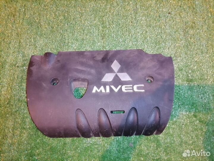 Декоративная крышка двс 1003A058 Mitsubishi Outlan