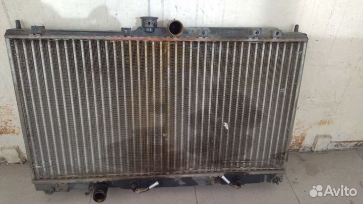 Радиатор двигателя на Mitsubishi Lancer 9