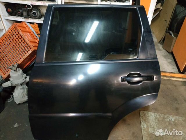 Дверь задняя без молдинга черная Ssang Yong Rexton