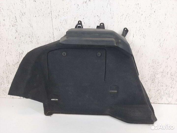 Обшивка багажника левая Opel Astra H