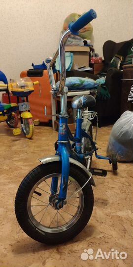 Детский четырехколëсный велосипед