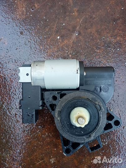 Моторчик стеклоподъемника задний левый mazda 6 GG