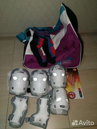 Роликовые коньки