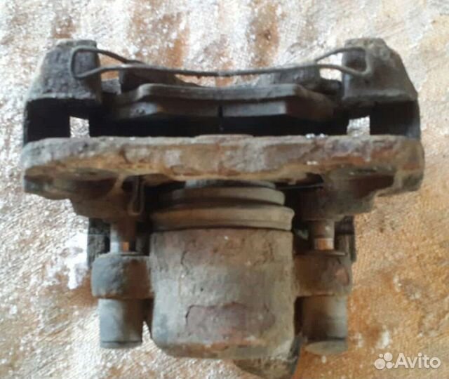 Суппорта передний Kia Spectra/Sephia II/Shuma