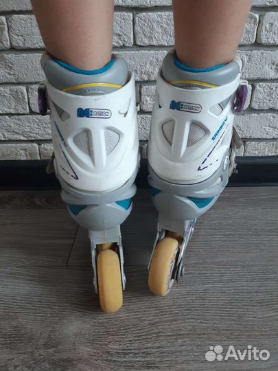 Роликовые коньки