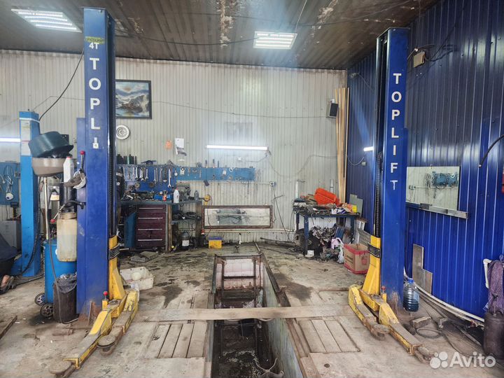 Подъемник автомобильный гидравлический