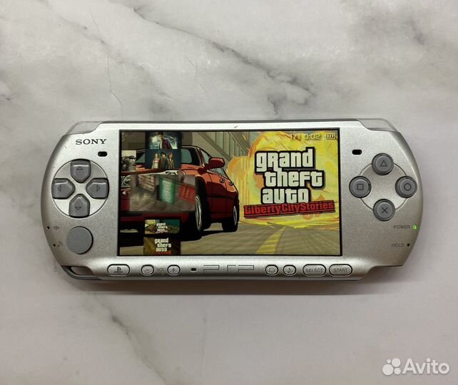 Sony PSP 3008 прошитая + 130 игр