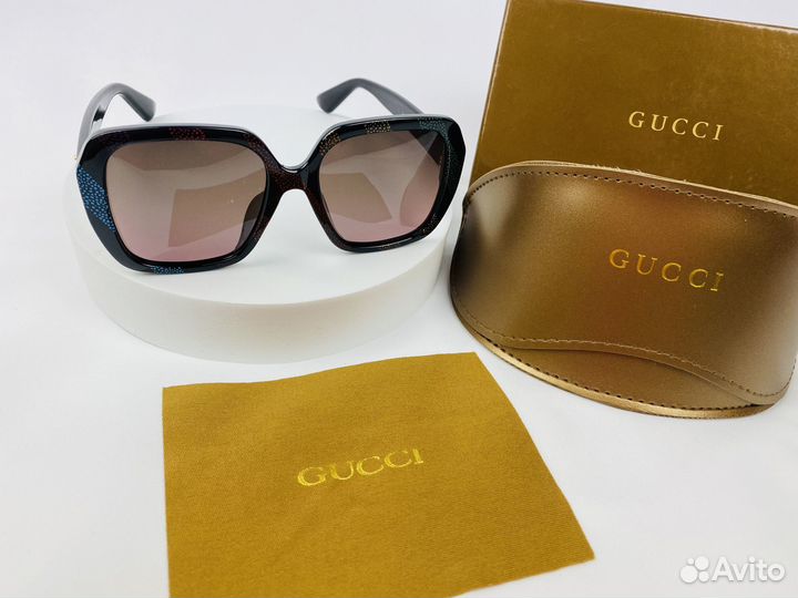 Солнцезащитные очки Gucci