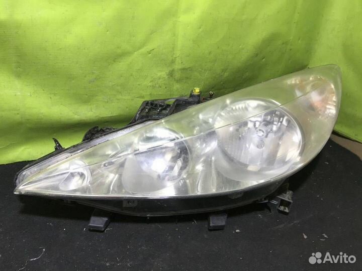 Фара левая галоген Peugeot 207 1 2006-2009 Хэт