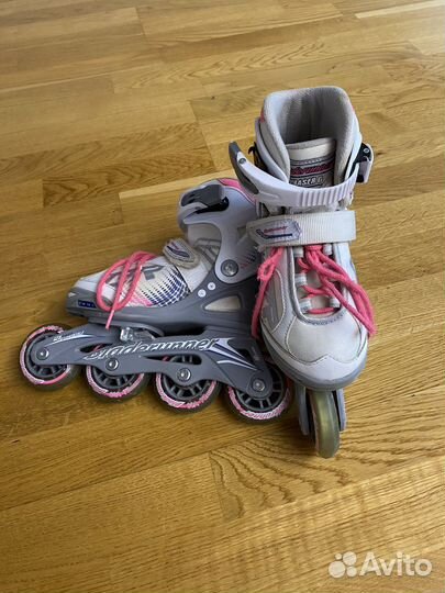 Роликовые коньки