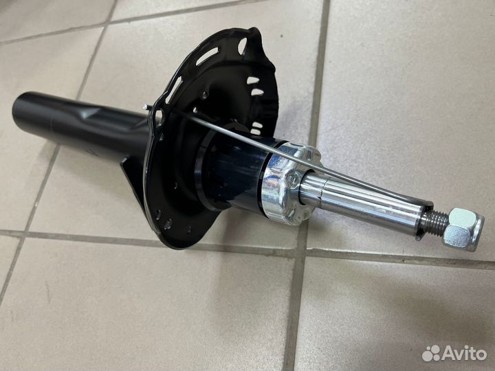 Стойка амортизатора Skoda Octavia A7 перед