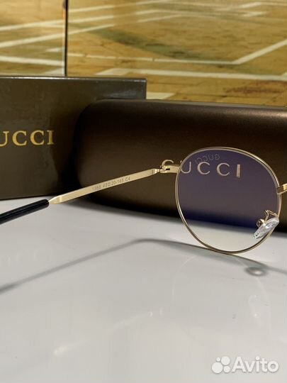 Солнцезащитные очки Gucci