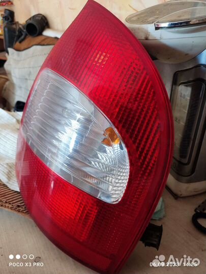Задний правый фонарь калина седан