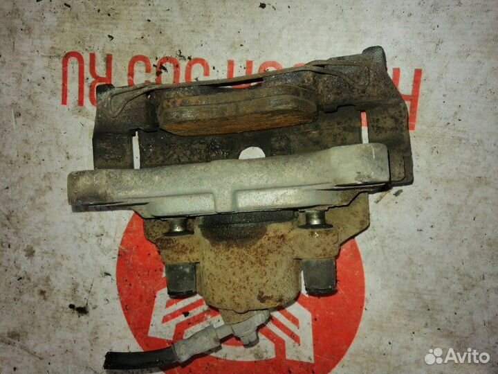 Суппорт передний правый Volkswagen Passat Alltrack