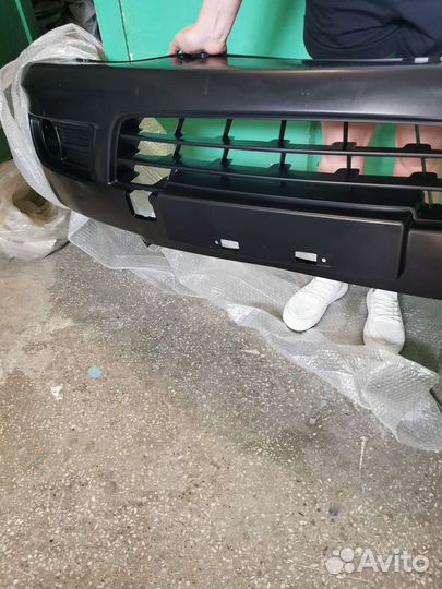 Бампер новый Nissan almera