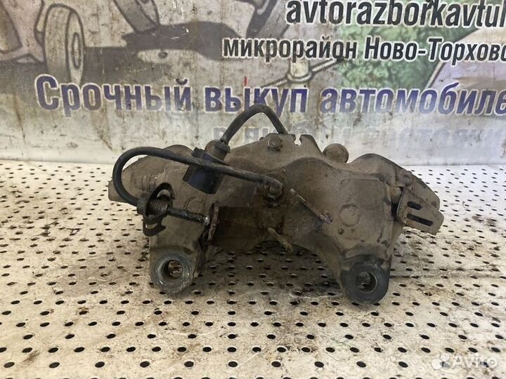 Суппорт тормозной задний левый Audi Q7