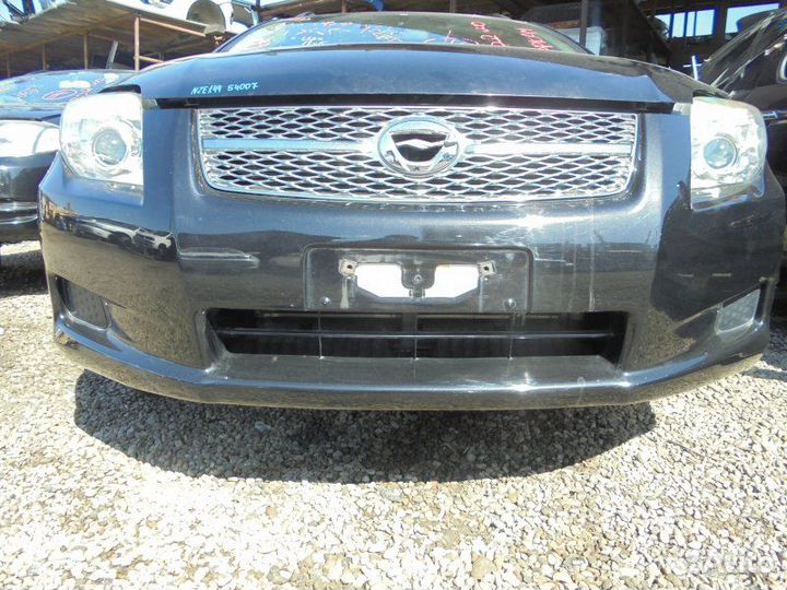 Бампер передний Toyota Corolla Fielder NZE144