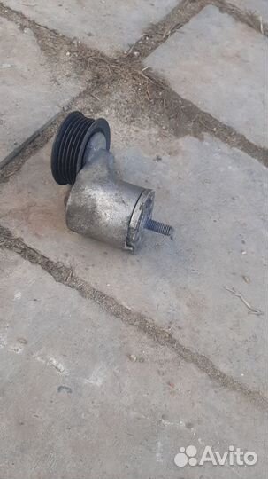 Натяжитель с роликом на Чери Фора,Вортекс Эстина