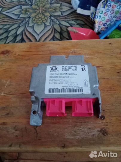 Блок управления подушками безопасности киа Венга 2