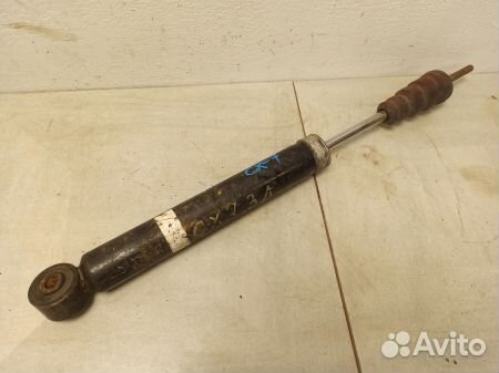 Амортизатор задний Мазда