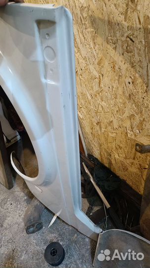 Крыло пластиковое переднее нива 2121