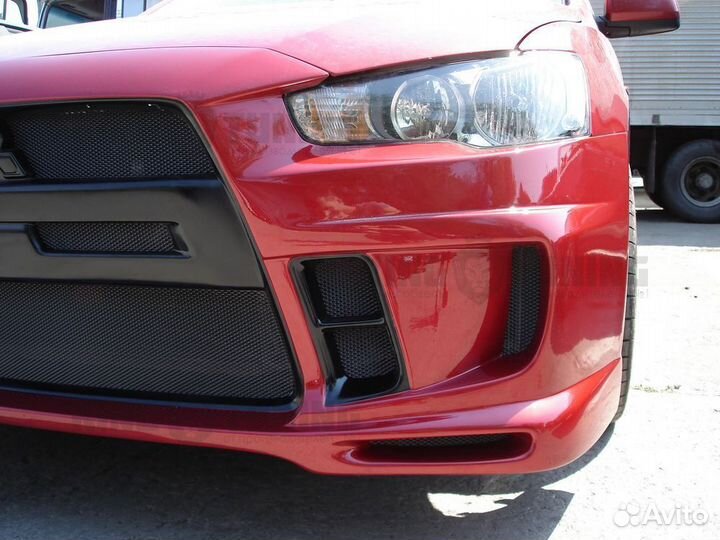 Передний бампер Extreme Mitsubishi Lancer 10