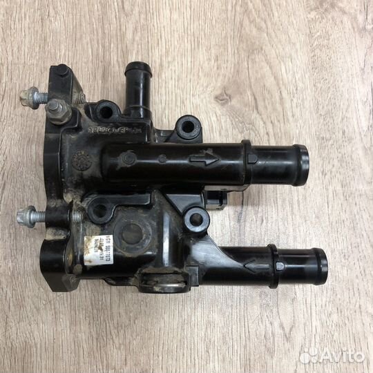 Корпус термостата Opel Astra h