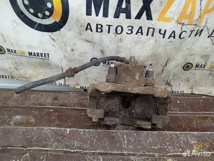 Суппорт тормозной Opel Zafira B 2005 перед. лев