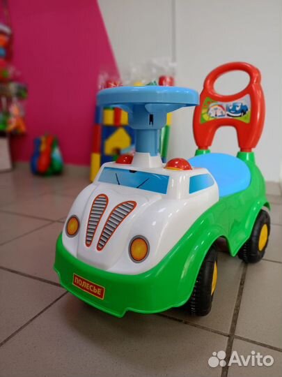Машинка каталка толокар