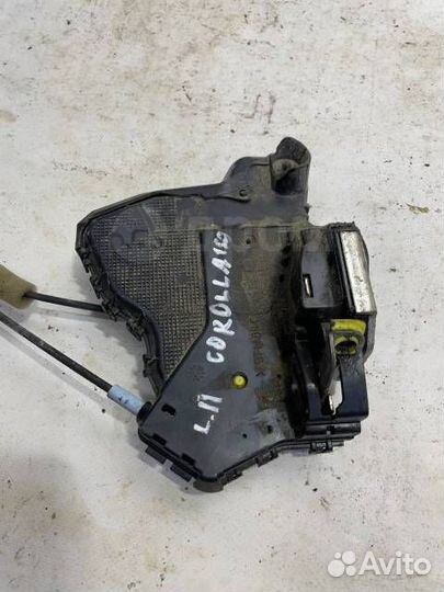 Замок двери передний левый Toyota Corolla E150