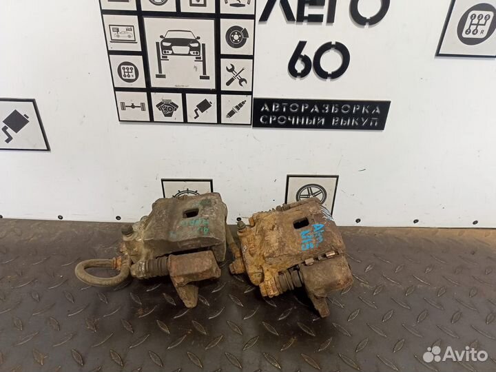 Суппорт тормозной передний для Nissan Almera N15