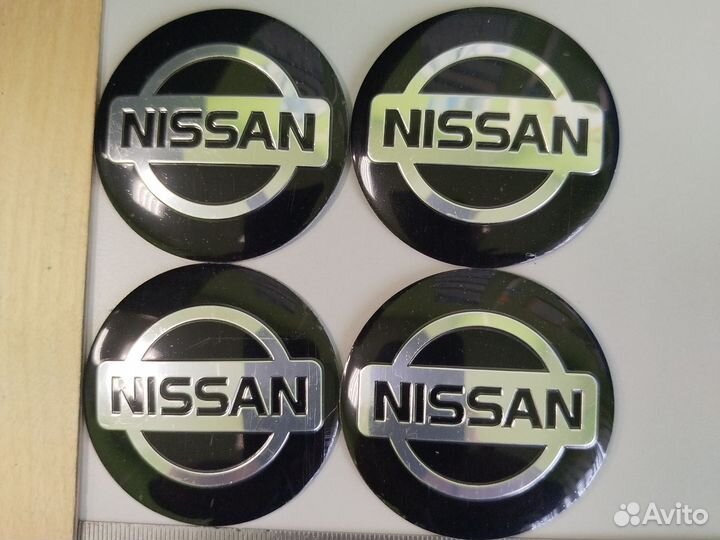 Наклейки на колачки для колёс nissan