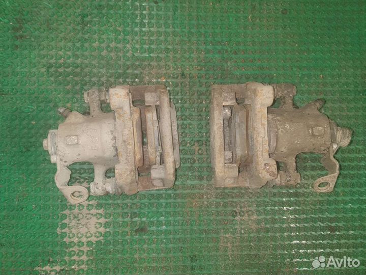 Суппорт тормозной задний Opel Astra GTC H