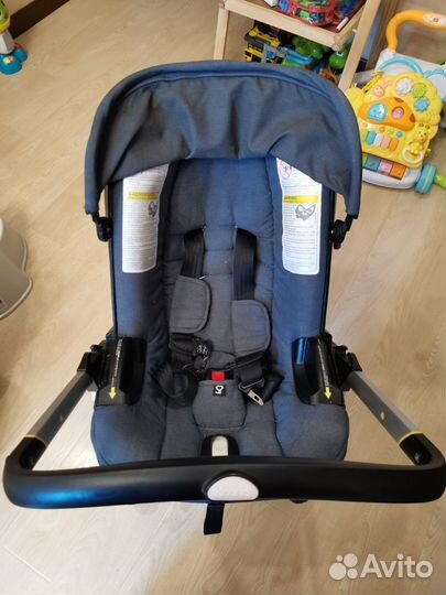 Коляска автокресло doona с базой isofix