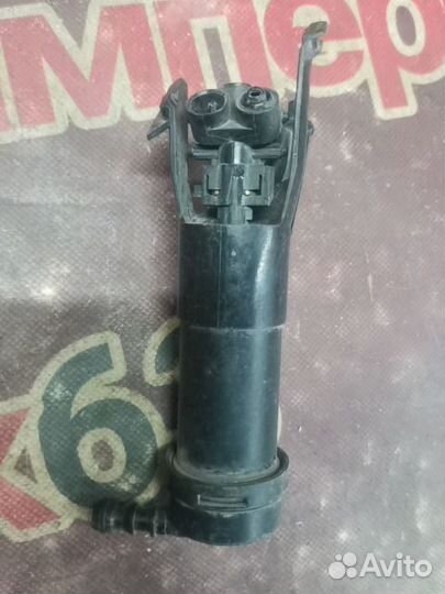 Форсунка омывателя фары Nissan Note