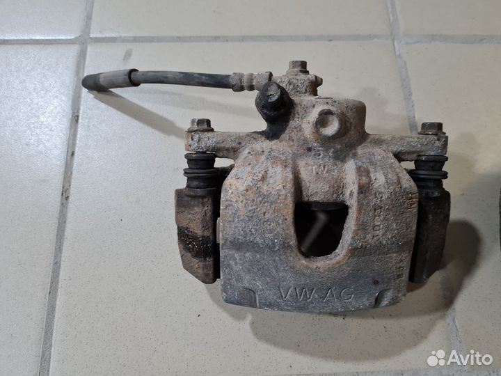 Суппорт передний Volkswagen Polo 5