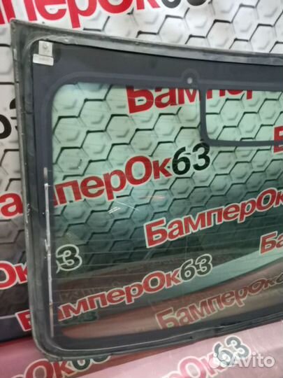 Стекло заднее Opel Astra J