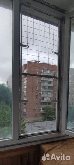 Защитная сетка от выпадения детей из окна