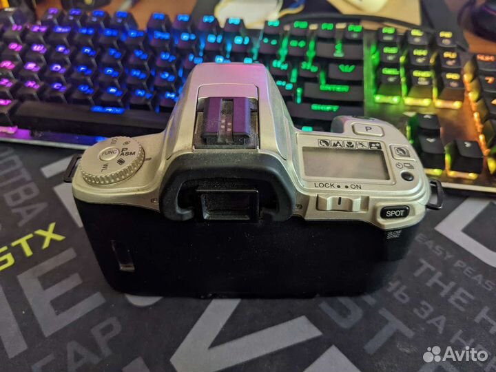 Плёночная зеркалка Minolta 404si