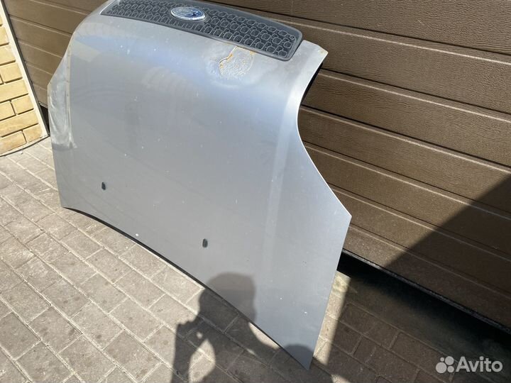 Капот с дефектом Ford Fusion