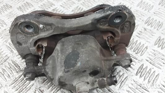 Суппорт тормозной передний левый KIA sportage 2 (A