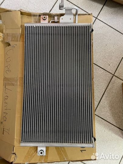 Радиатор кондиционера Elantra 95