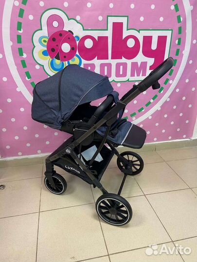 Прогулочная коляска с реверсивным блоком